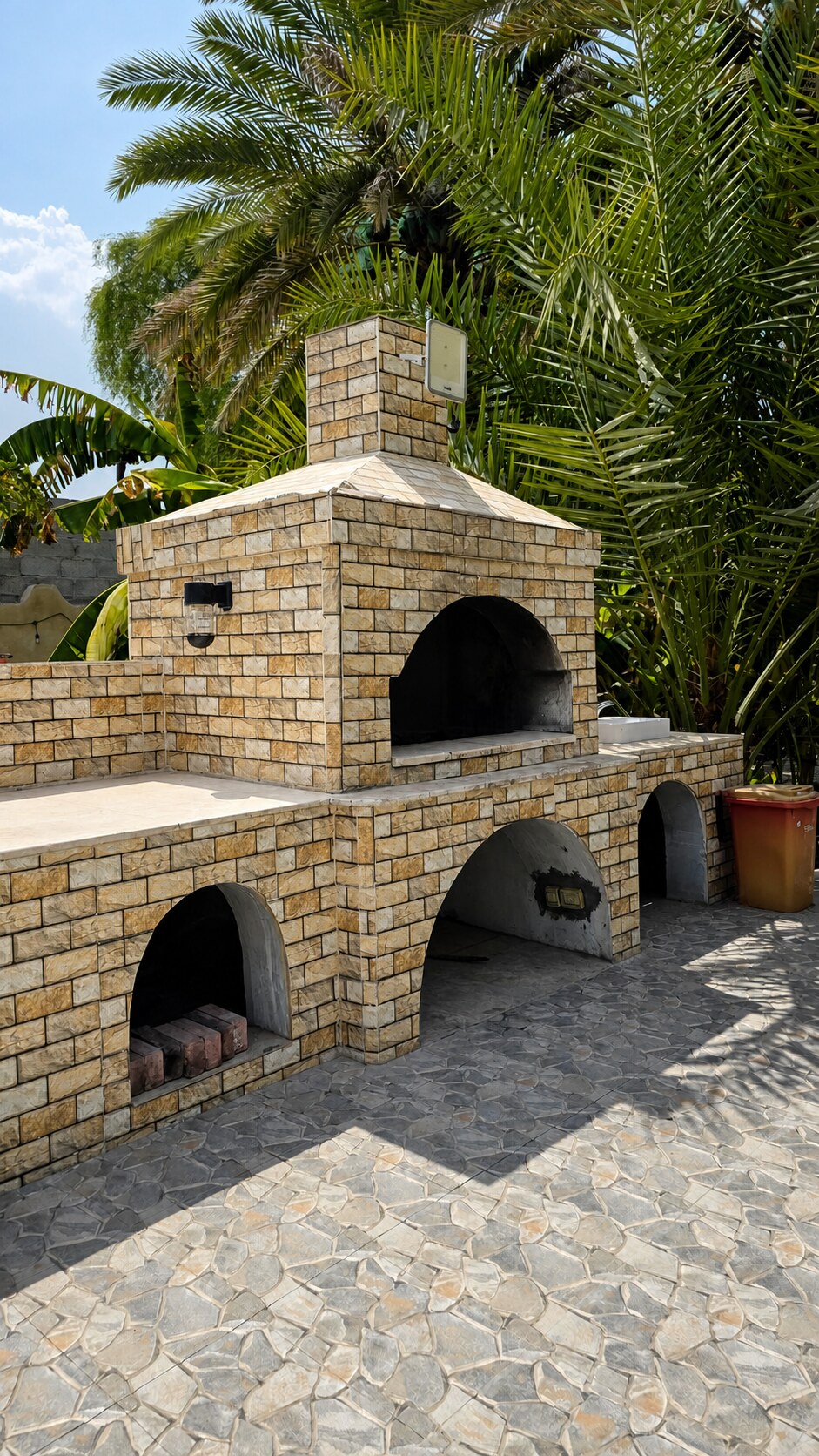 Large stone barbecue in the Family Retreat garden